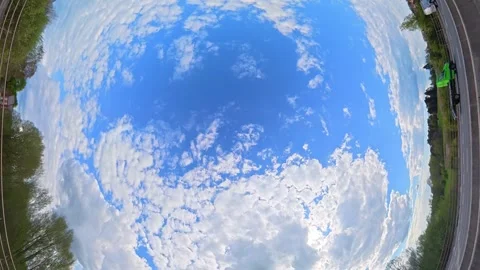 Straight UP View to Sky and Clouds During Long British Road Travel Stock Footage 333712617