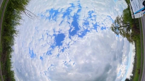 Straight UP View to Sky and Clouds During Long UK Road Travel Stock Footage 333714339
