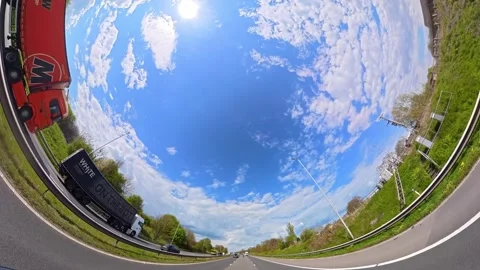 Straight UP View to Sky and Clouds During Long UK Road Travel Stock Footage 333716527
