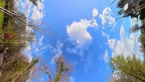 Straight UP View to Sky and Clouds During Long UK Road Travel Stock Footage 333747204