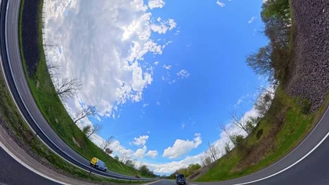 Straight UP View to Sky and Clouds During Long UK Road Travel Stock Footage 333750440
