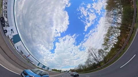 Straight UP View to Sky and Clouds During Long UK Road Travel Stock Footage 333752401