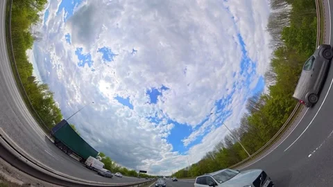 Straight UP View to Sky and Clouds During Long UK Road Travel Stock Footage 333762589