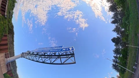 Straight UP View to Sky and Clouds During Long UK Road Travel Stock Footage 334064495