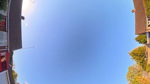 Straight UP View to Sky and Clouds During Long UK Road Travel Stock Footage 334086478