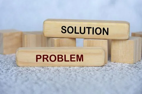 Straight view of solution to a problem text on wooden blocks. 스톡 사진
