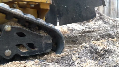 Strain cutter wheel tracks close view as it moves forward.  Stock Footage 154768733