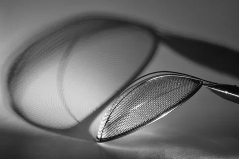 Strainer,sieve or colander,close up of kitchen tool, black and white Stock Photos
