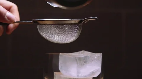 Straining a cocktail in slow motion Stock Footage 83862869