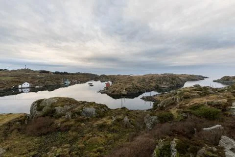 The strait between Rovar and Urd, two islands in The Rovaer archipelago in Stock Photos