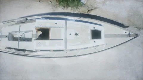 Stranded abandonned boat on the beach Stock Footage 142058578