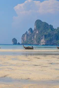 Stranded boat at a beach on Phi Phi Island 写真素材