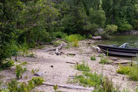 Stranded boat on beach Stock Photos