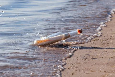 A stranded message in a bottle Stock Photos