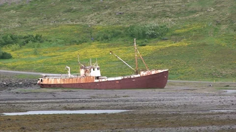 Stranded old boat on a fjord Stock Footage 37313657