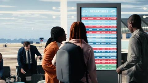 Stranded people react to bad news of cancelled flights and suspended departures Video stock 333246982