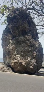 Stranded rocks by the roadside Stock Photos