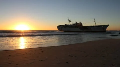 Stranded Ship on Clifton Beach, Sunset Stock Footage 11056412