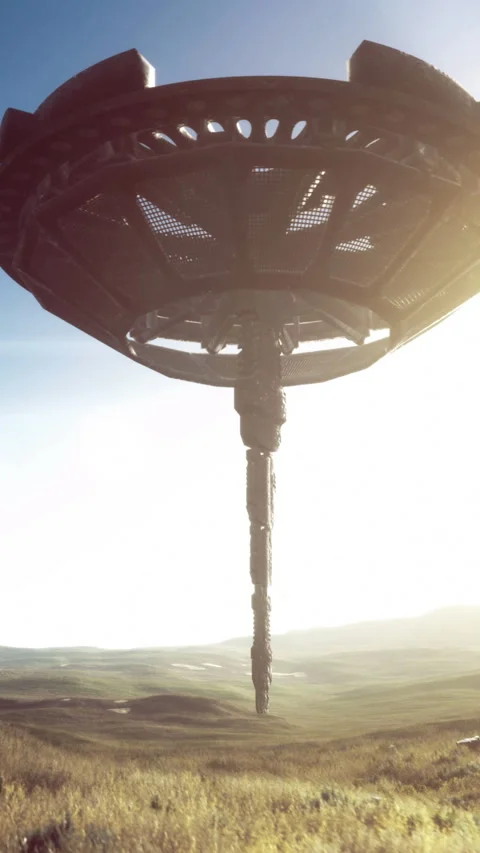 Strange alien ship hovers above a serene landscape under a bright sun Stock Footage 329136220
