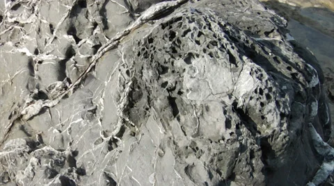 Strange basalt rock formations on the shore of Rhodes Stock Footage 32302296