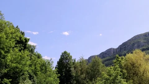 Strange clouds above the mountain Stock Footage 311381496
