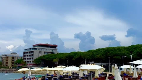 Strange clouds. They look like galloping horsemen. Beach. Sea. Stock Footage 246766674