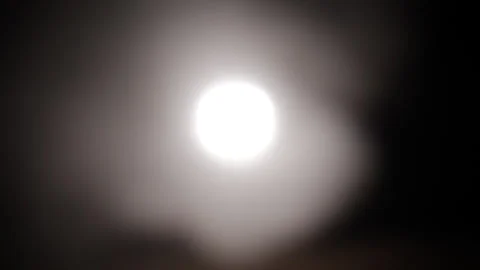 Strange, glowing, alien, UFO orb light, ghost or moon light with smoke and Stock Footage 254486543