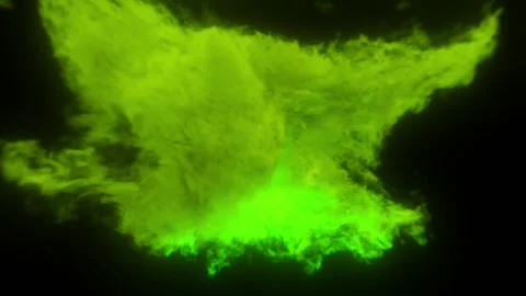 A strange green cloud glows from within against a black background. Stock Footage 171080608