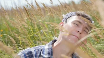 Strange Guy Bites Off The Ear Of Grass Stock Footage 85486786