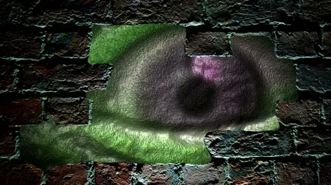 Strange looking eye peering through a hole in brick wall Stock Footage 943947