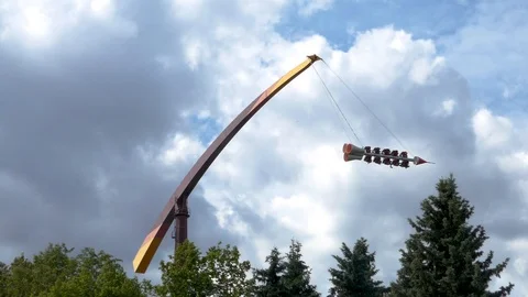 Strange looking rocket shape ride toy in a Russian style amusement park Stock Footage 91463517