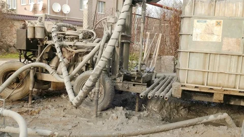 Strange machine makes a well Stock-Footage 105679198