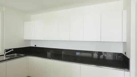 Strange man opened and closed the doors in the kitchen Stock Footage 117097185