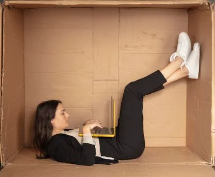 Strange position for office work Stock Photos