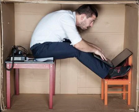 Strange position to work Foto stock
