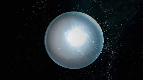 Strange pulsating object appears in outer space after strong explosion. UFO Stock Footage 98756483