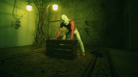 Strange strong man doing handstand Stock Footage 77993935