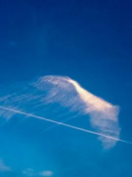 Strange unique cloud and jet stream Stock Photos