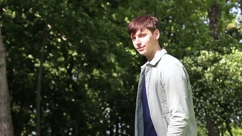 Strange young guy in the woods. Stock Footage 75550253