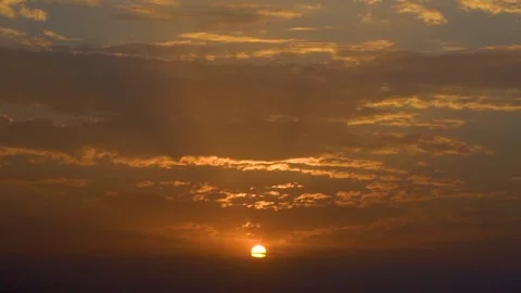 Strangely shaped clouds and sunlight natural landscape at sunset.Colorful sk Stock Footage 284446129