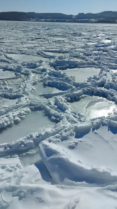 Strangely shaped ice floes on the surface of the sea in winter Stock Footage 264427239