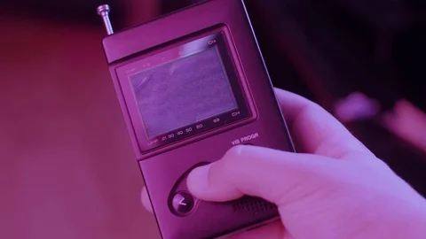 Stranger Things Cinemagraph 80s Channel Surfing on a Tiny Portable Tv Stock Footage 81543215