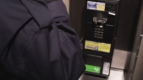 Stranger Using Pay Phone Stock Footage 65193810