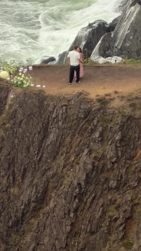 Stranger's Cliffside Proposal Caught on Camera, Astoria, Oregon, USA - 22 Aug 20 Video stock 343895481