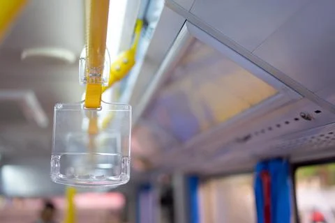 The straps on the train hold hands on the bus to hang firmly when there are l Stock Photos