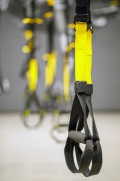 Straps training loop equipment. Black functional training equipment on grey b Foto stock