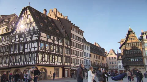 Strasbourg pedestrian zone with half timbering townhouse with sun reflecting Stock Footage 59559232