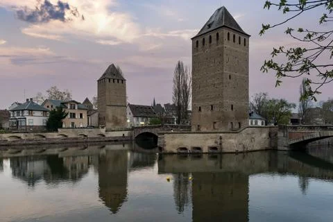 Strasbourg reflected in the River Ill at dusk in Alsace, France Stock Photos