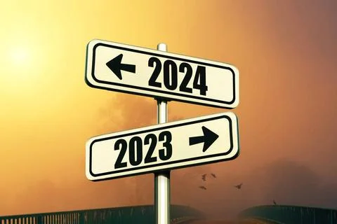 Straßenschilder zeigen den Weg zum neuen Jahr 2024 und zum alten Jahr 2023.. Stock Photos