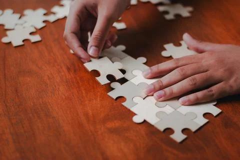 Strategic business puzzle solving creative workspace indoor close-up view c.. 스톡 사진